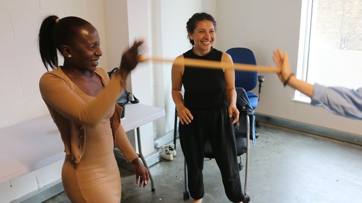 Participants move around the studio space during a workshop with Hilanderas.with 