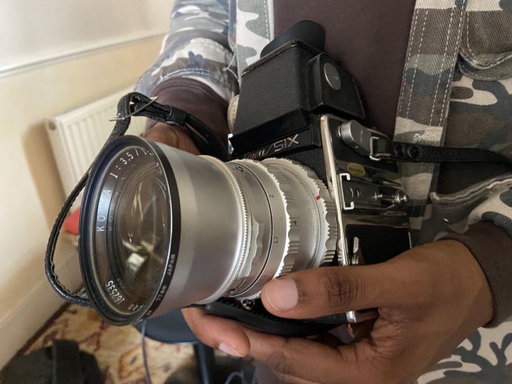 Tex's nephew holding camera