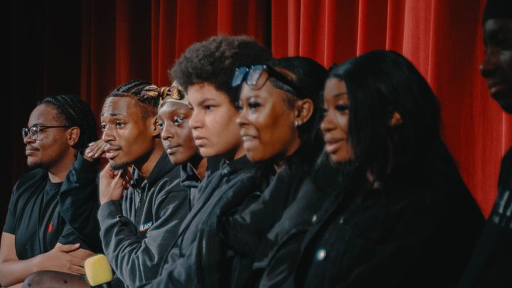 A group of young people on stage at the Rio cinema 
